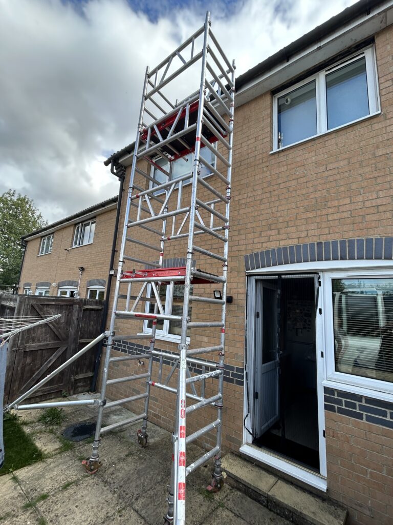 Gutter repairs from scaffold tower